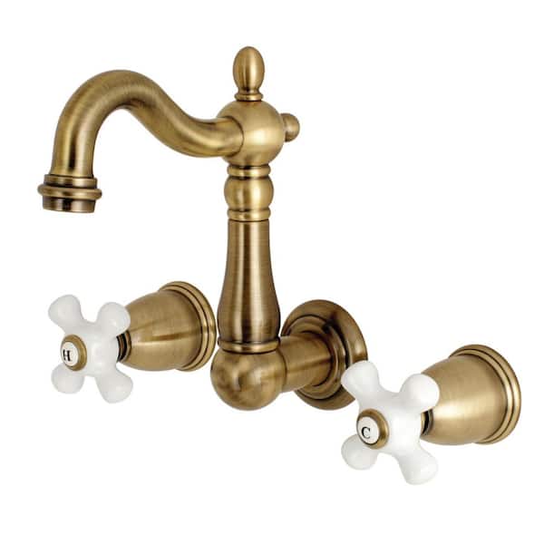 Kingston Brass Heritage 2-Handle Wall Mount Bathroom Faucet in Antique Brass