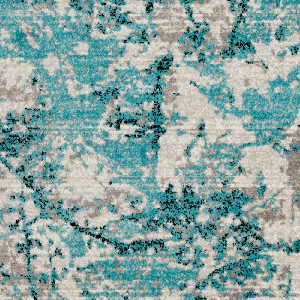 Vibrant Blue and Ivory Abstract Synthetic 6' x 9' Area Rug