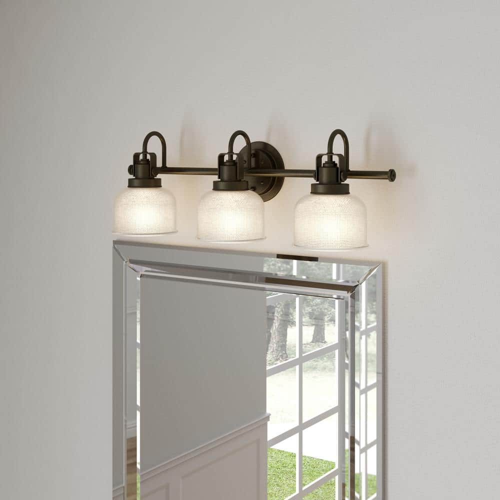 Archie Collection 26-1/4 in. 3-Light Venetian Bronze Clear Double Prismatic Glass Coastal Bathroom Vanity Light price history on PriceWatchPro
