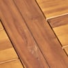 Close-up of teak wood plank texture on the table.