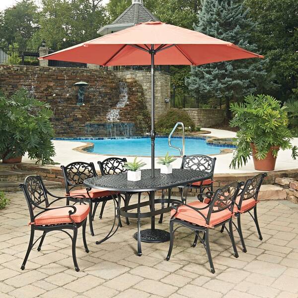 HOMESTYLES Biscayne Black 9-Piece Cast Aluminum Outdoor Dining Set with Coral Cushions