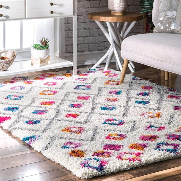 https://images.thdstatic.com/productImages/11e19191-9c98-4cbb-9fb3-009cfdd90031/svn/pink-multi-nuloom-kids-rugs-ozxl04a-508-e1_600.jpg