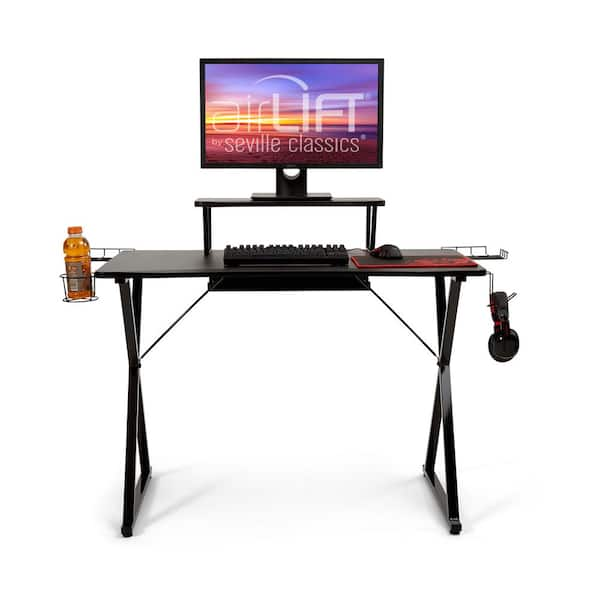 https://images.thdstatic.com/productImages/11ea7c51-9205-413e-a0ba-8bb2a19307b7/svn/black-seville-classics-gaming-desks-off65922b-4f_600.jpg