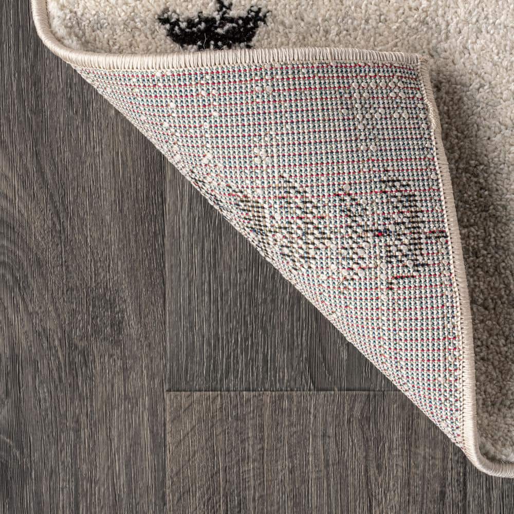 Zaina 8' x 10' Black and Cream Geometric Synthetic Area Rug
