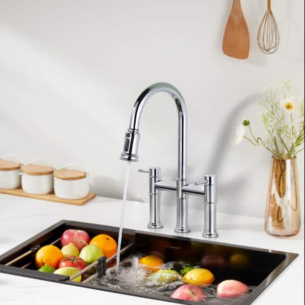 Double Handle Pull-Down High Arc Bridge Kitchen Faucet with Brass and Stainless Steel in Polished Chrome