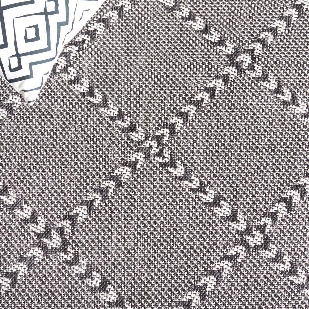 Percival Black and Ivory Geometric 8' x 10' Synthetic Area Rug