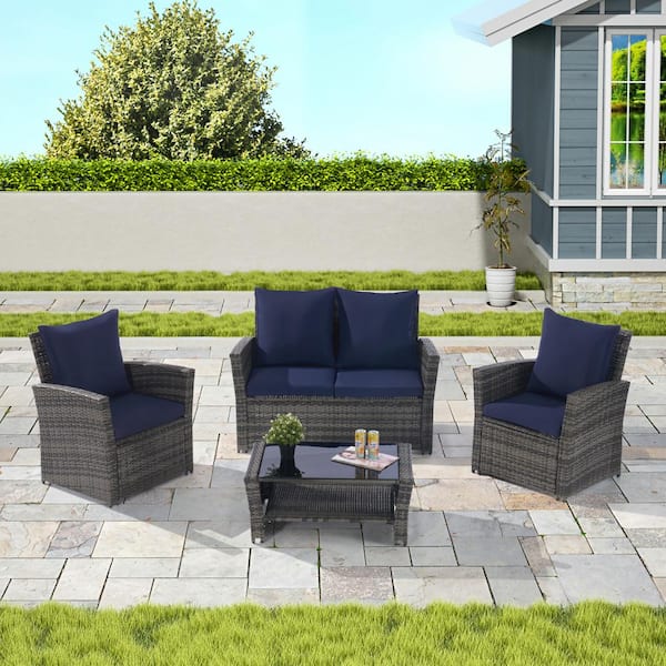 Sudzendf Gray 4-Piece Wicker Outdoor Patio Conversation Set with Tempered Glass Coffee Table and Dark Blue Cushions