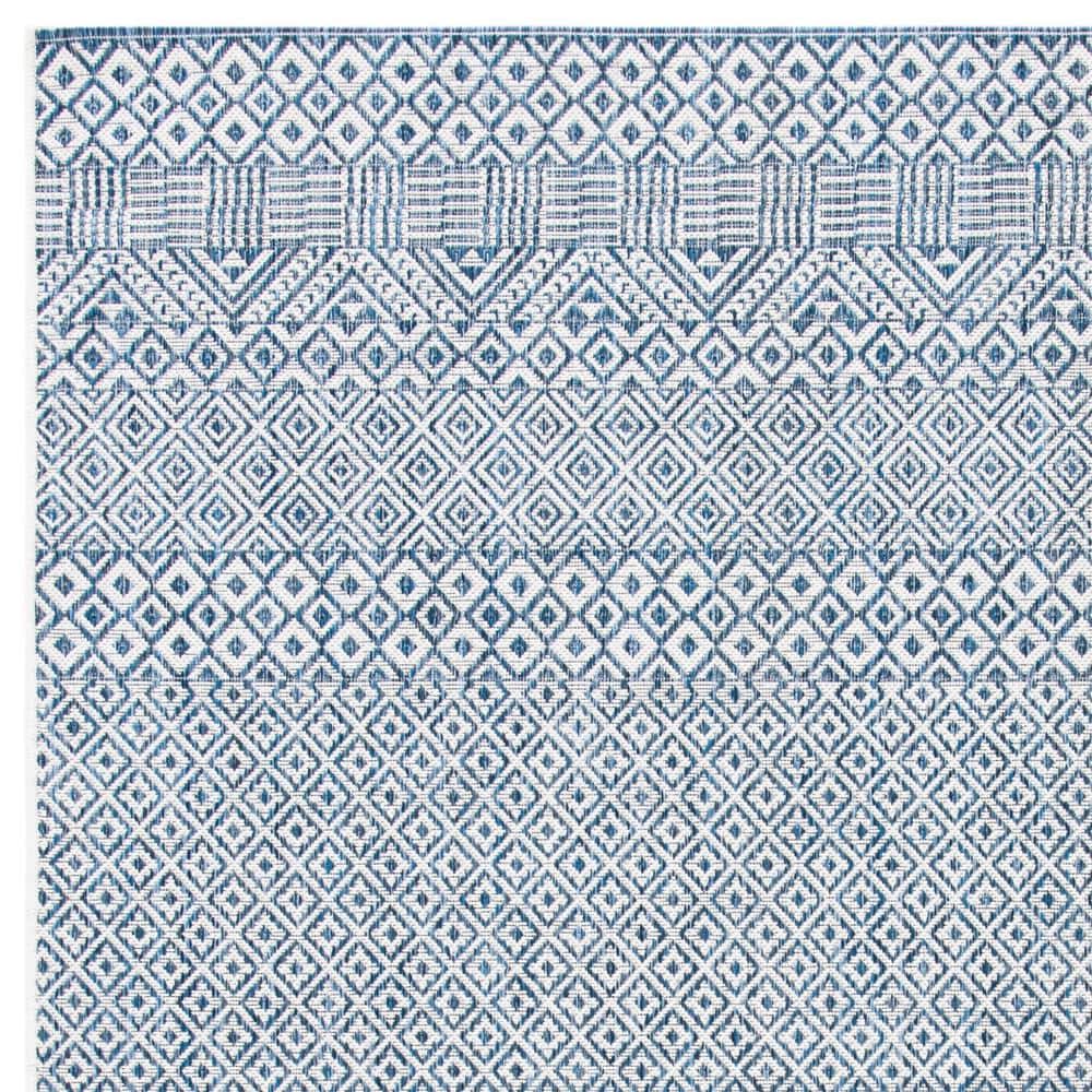 Blue and Navy Rectangular Synthetic Indoor/Outdoor Rug