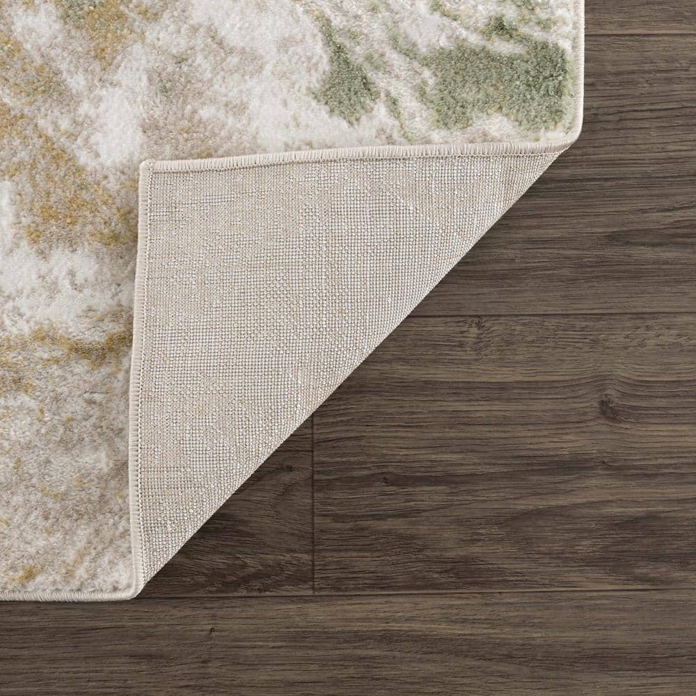 Green and Cream Abstract Polypropylene Area Rug 6'7" x 9'
