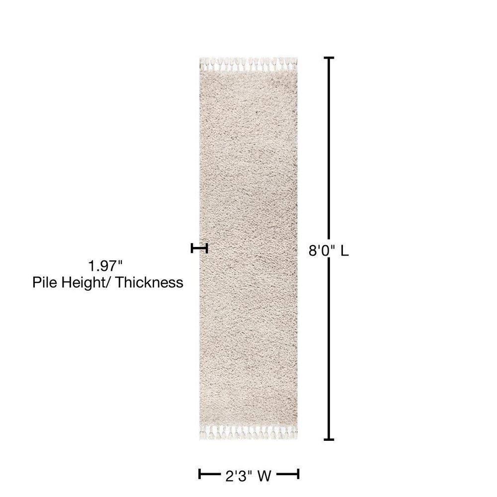 Cream 2 x 8 Shag Reversible Synthetic Area Rug with Tassels