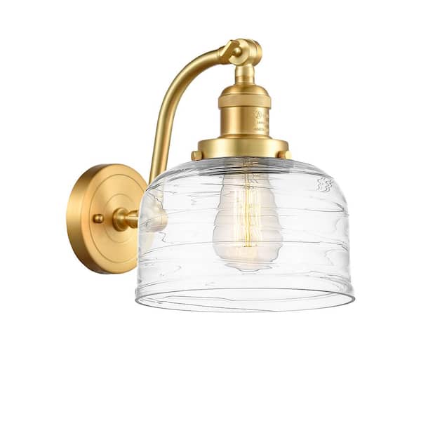 Innovations Bell 1-Light Satin Gold, Clear Deco Swirl Wall Sconce with Clear Glass Shade