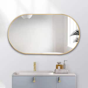 36 in. W x 18 in. H Oval Stainless Steel Framed Wall Bathroom Vanity Mirror in Gold
