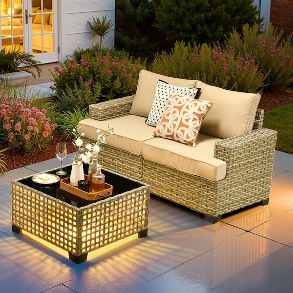 XIZZI Solstice Wicker Outdoor Couch with Beige Cushions and Coffee