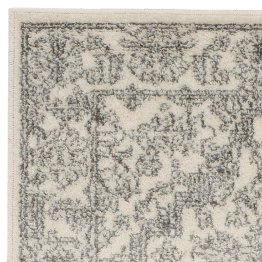 Ivory and Silver Medallion Synthetic Runner Rug