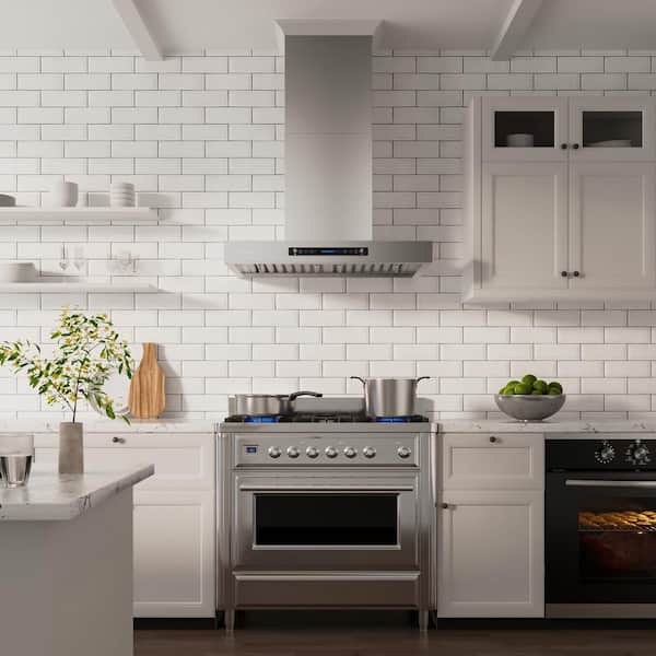 https://images.thdstatic.com/productImages/12773f02-eea0-439f-99cc-790b6389a89c/svn/stainless-steel-wall-mount-range-hoods-ikp01-36-31_600.jpg