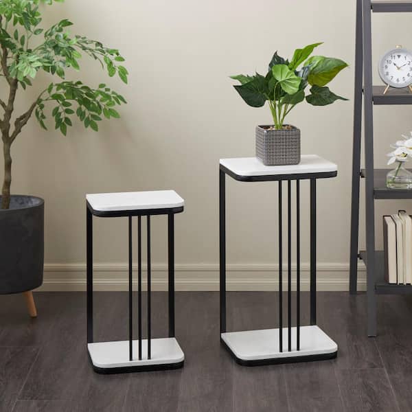 Litton Lane Large Black Metal Geometric Linear Rod Plantstand with Curved Marble Tabletops (Set of 2)