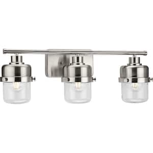 Beckner Collection 24.12 in. 3-Light Brushed Nickel Clear Glass Urban Industrial Vanity Light