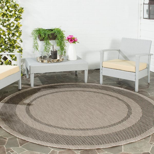 Courtyard Beige/Black 7 ft. x 7 ft. Round Striped Indoor/Outdoor Patio  Area Rug