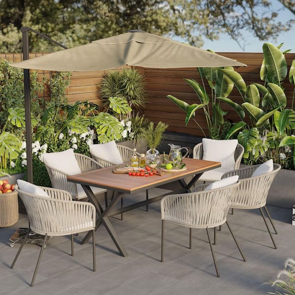 7-Piece Metal Outdoor Dining Set with Beige Cushions and Pillows