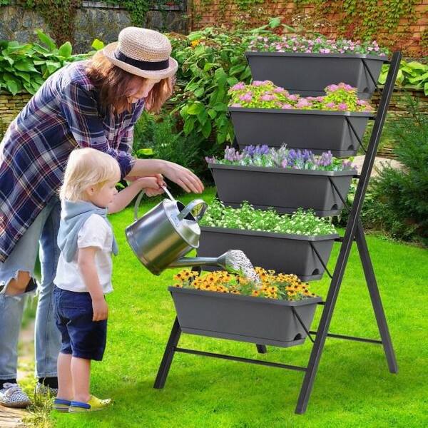 Image of Galvanized steel garden bed with vertical slatted design