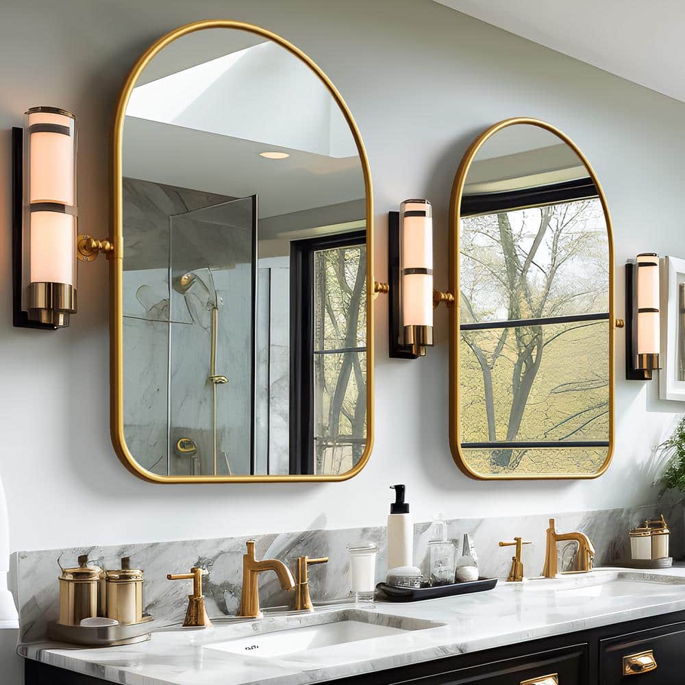 24 in. W x 35 in. H Arched Metal Framed Pivoted Bathroom Wall Vanity Mirror