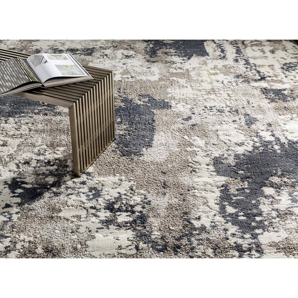 Blue and Beige Abstract 9' x 12' Synthetic Area Rug