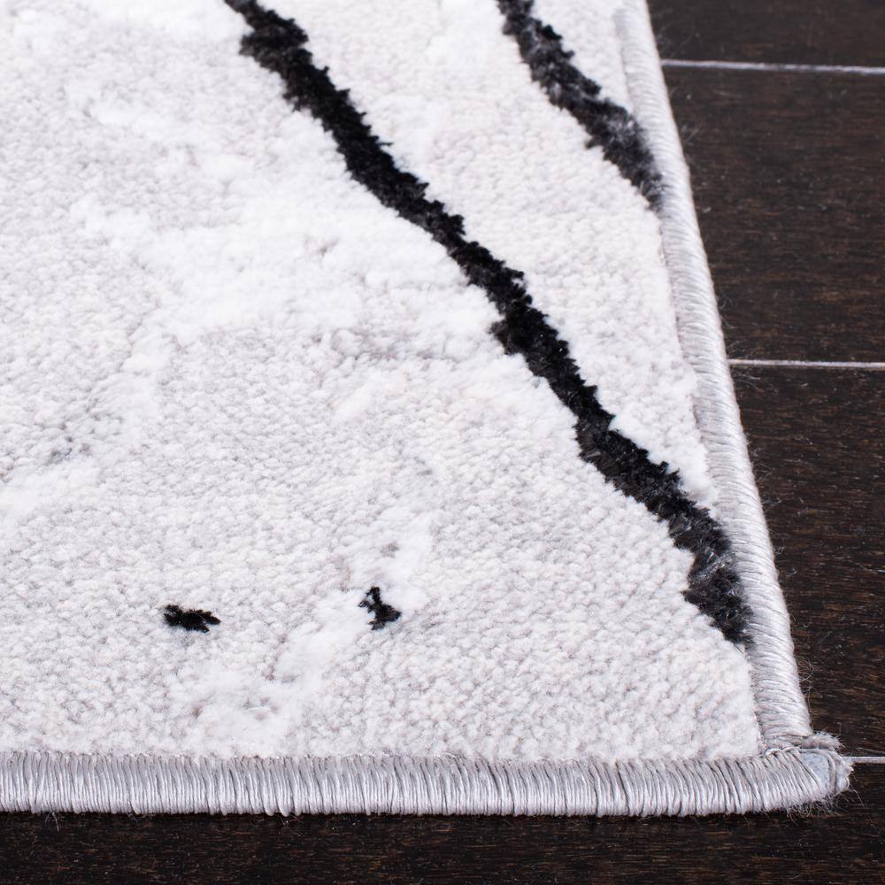 Gray and Black Abstract 8' x 10' Synthetic Area Rug