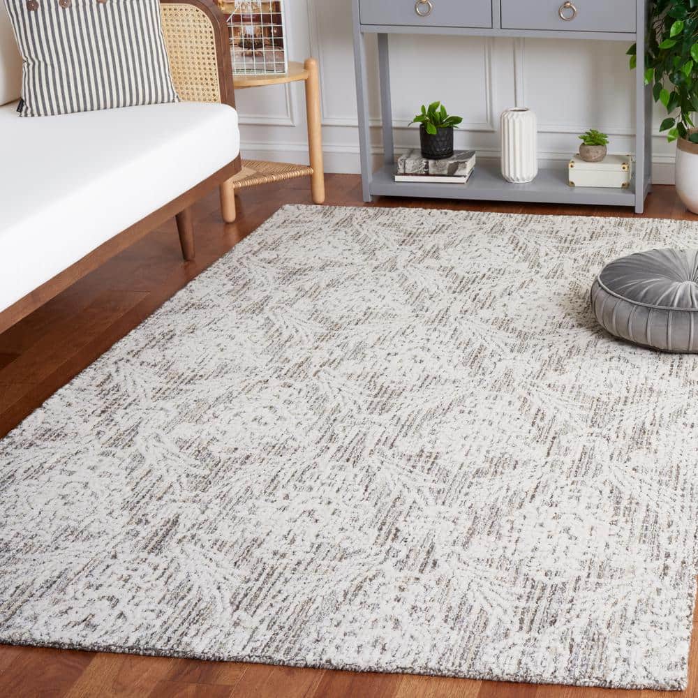 Ivory and Gray Tufted Wool 8' x 10' Area Rug