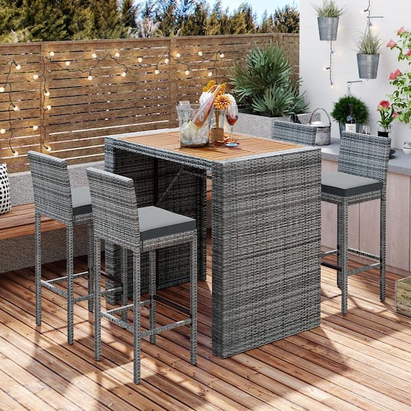 Zeus & Ruta 5-Piece Brown Wood Gray Wicker Outdoor Serving Bar Set, Bar Height Chairs with Gray Cushion, Acacia Wood Table Top
