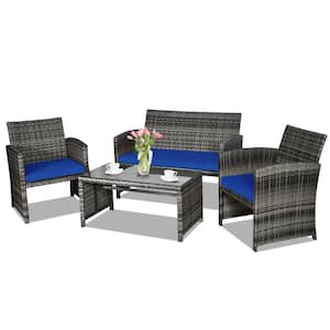 4-Piece Rattan Wicker Patio Conversation Set with Glass Table and Navy Cushions