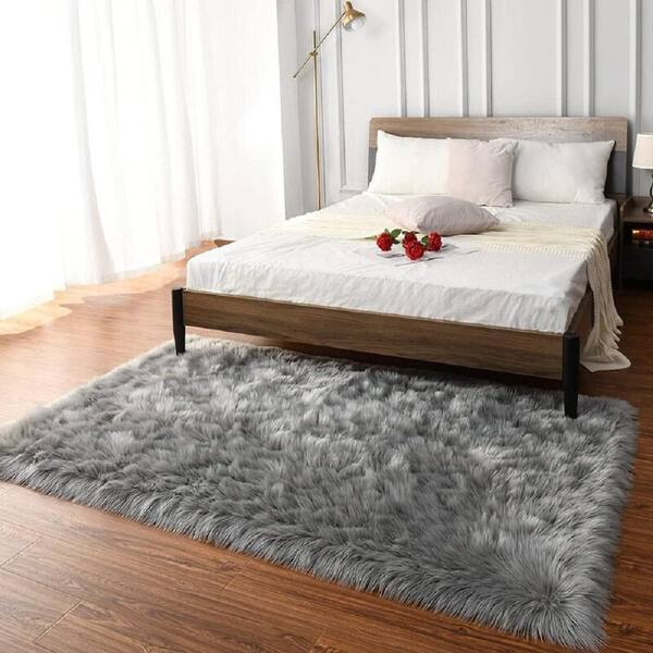 GHOUSE Silky Faux Fur Sheepskin Shag Light Gray 8 ft. x 10 ft
