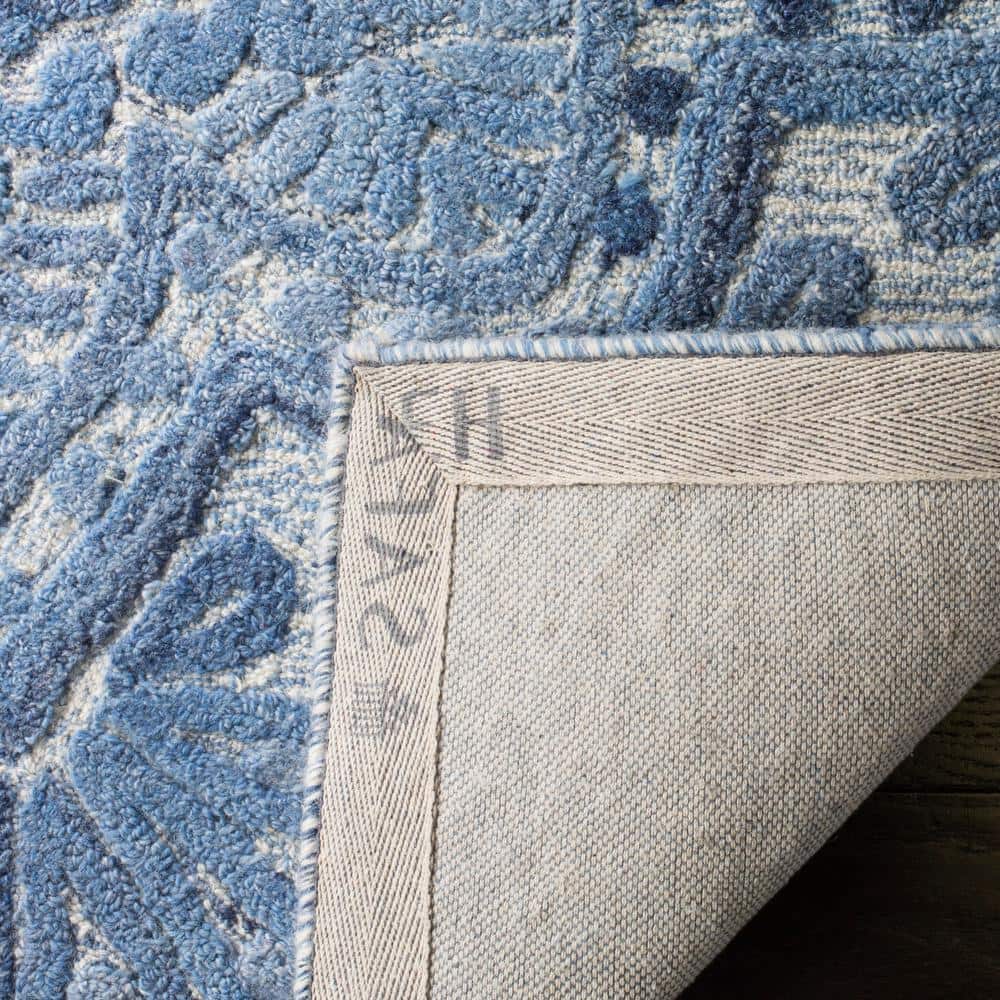 Hand-Tufted Elegance Blue/Ivory Wool 9' x 12' Rug