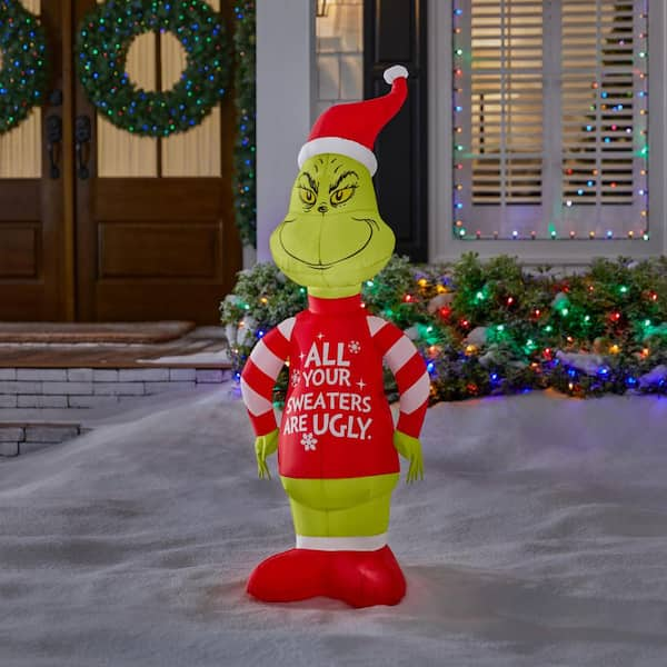 Grinch 9 ft. LED Grinch with Merry Christmas Letters Inflatable 23GM82683 -  The Home Depot