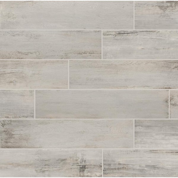 Florida Tile Home Collection Serene Wood Light Grey 8 in. x 36 in. Matte Porcelain Floor and Wall Tile (15.54 sq. ft./Case)