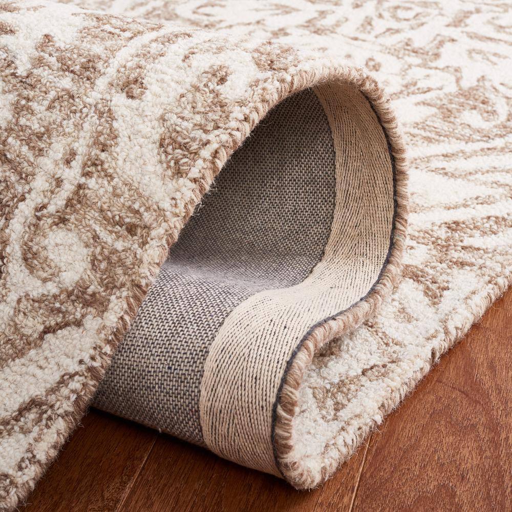 Ivory and Beige Tufted Wool Abstract Area Rug, 5' x 8'