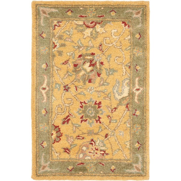 https://images.thdstatic.com/productImages/135231c6-9160-4277-ae7f-c6bb3222af0d/svn/gold-safavieh-area-rugs-at21c-2-64_600.jpg