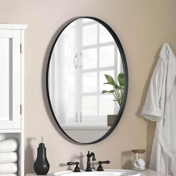 KOHROS 28 in. W x 18 in. H Framed Oval Bathroom Vanity Mirror