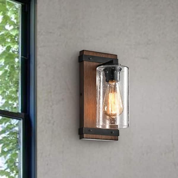 Jojospring Mary 4.9 in. Wide 1-Light Antique Black Metal and Natural Wood Base Wall Sconce with Clear Glass Shade