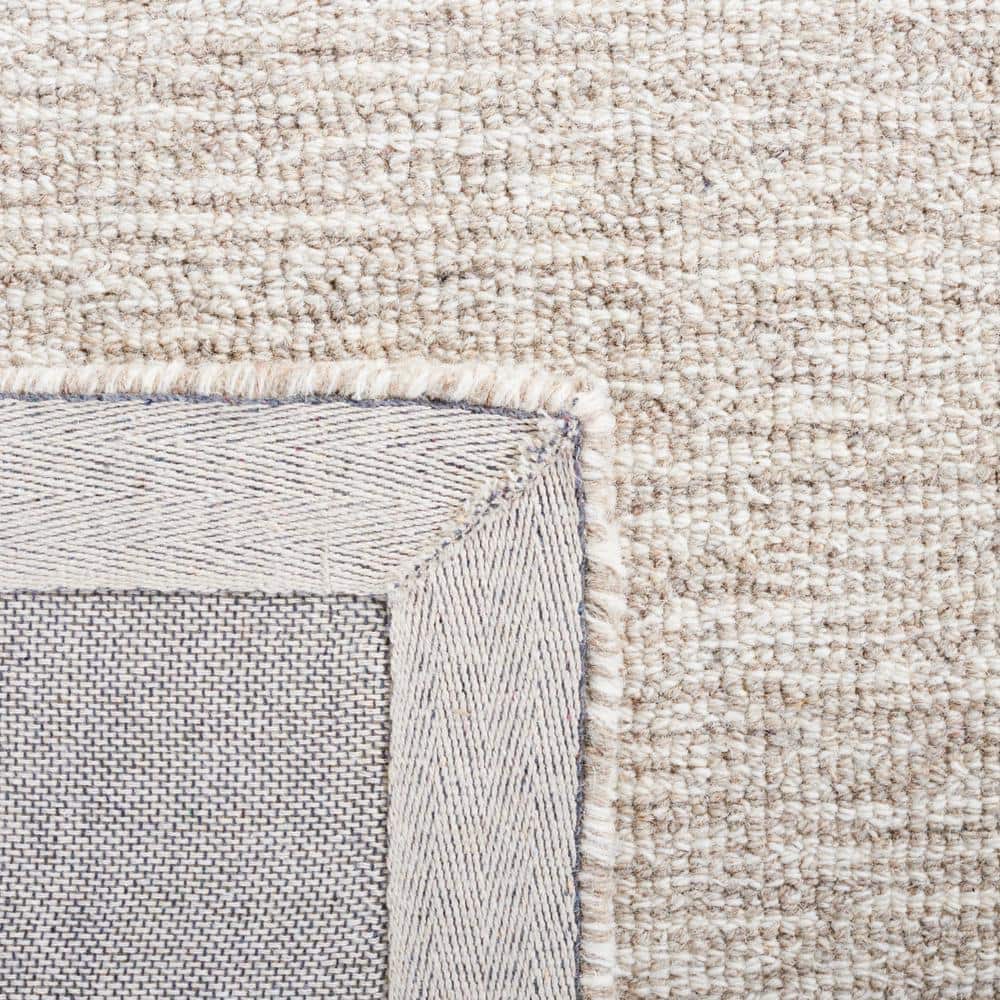 Ivory Abstract Handmade Tufted Wool 6' x 9' Rug