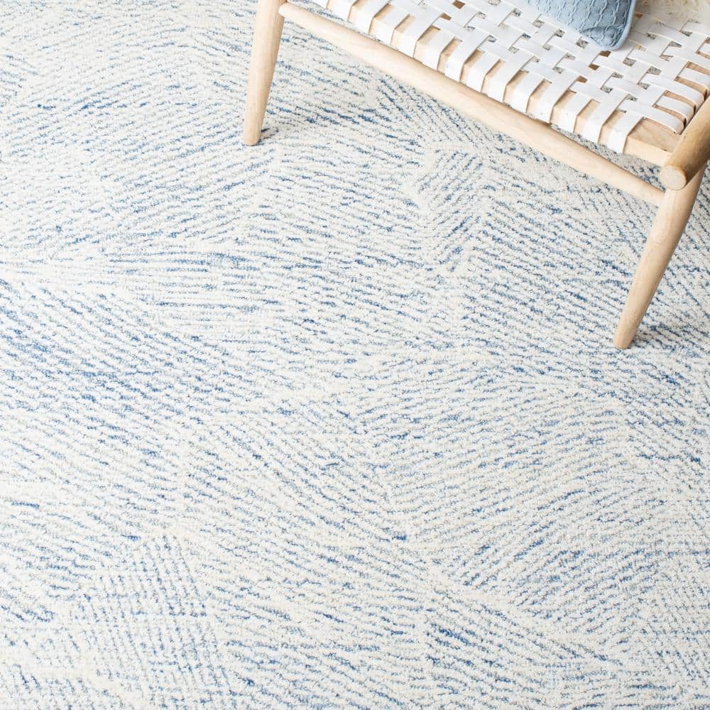 Blue and Ivory Floral Hand-Tufted Wool Area Rug, 5' x 8'