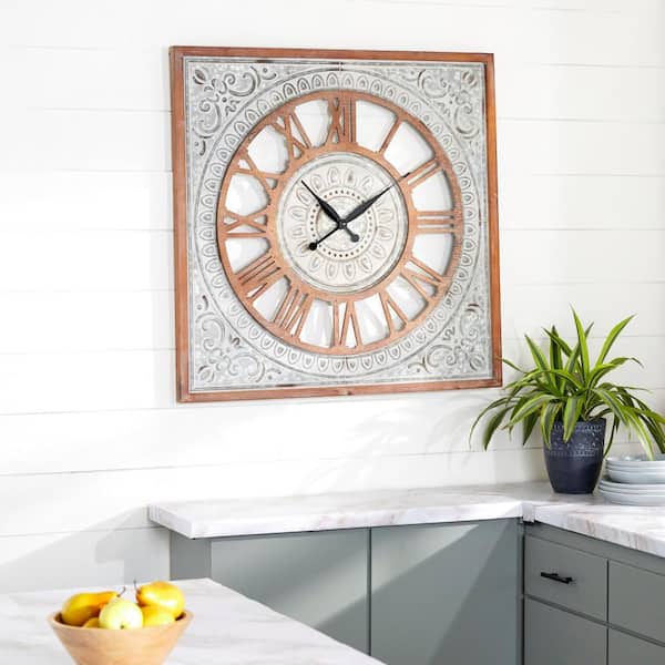 Litton Lane 36 in. x 36 in. Brown Metal Scroll Wall Clock with Embossed Metal