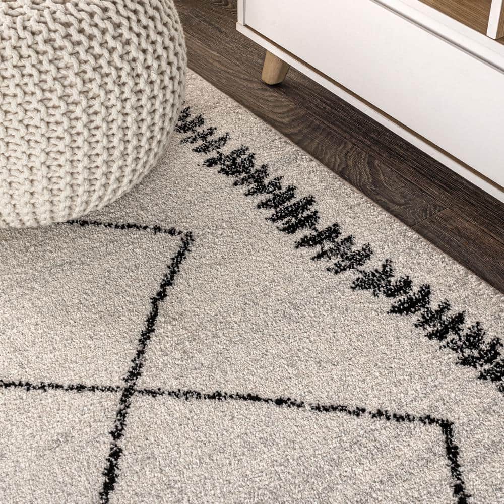 Zaina 8' x 10' Black and Cream Geometric Synthetic Area Rug