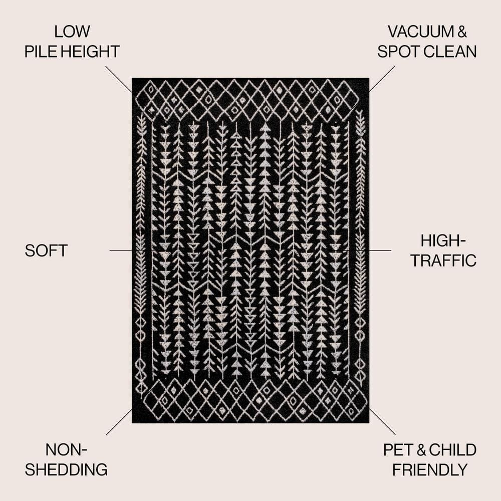 3' x 5' Black and Cream Synthetic Moroccan Geometric Area Rug