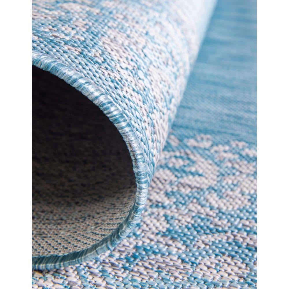 Aqua Floral Bliss Easy-Care Synthetic Outdoor Rug 7'1" x 10'