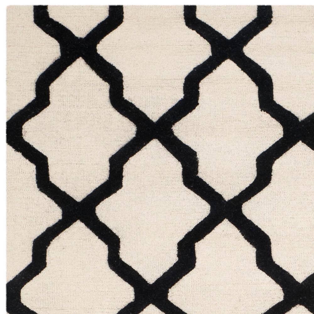 Handmade Cambridge Black/Ivory Wool 8' x 10' Tufted Area Rug