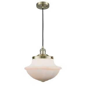 Oxford 1-Light Antique Brass Schoolhouse Pendant Light with Matte White Glass Shade