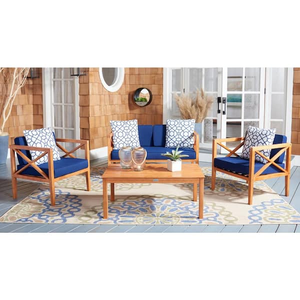 SAFAVIEH Nunzio Natural 4-Piece Wood Patio Conversation Set with Navy Cushions and Geometric White Pillow