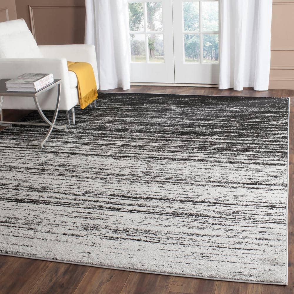 Silver and Black Abstract Low Pile Area Rug, 9' x 12'