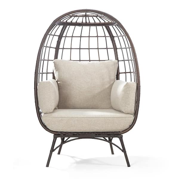 Brown Wicker Outdoor Patio Egg Lounge Chair with Beige Cushions and Pillows