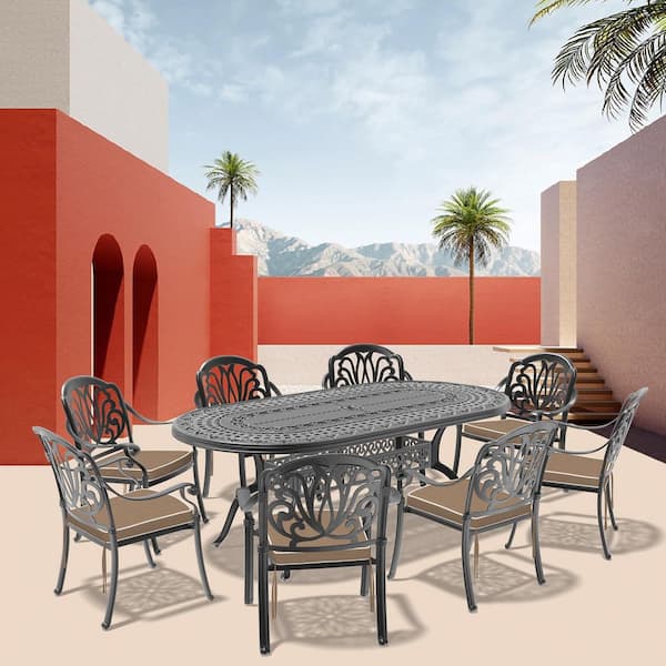 Black 9-Piece Cast Aluminum Oval Outdoor Dining Set with Stackable Chairs and All-Weather Cushions